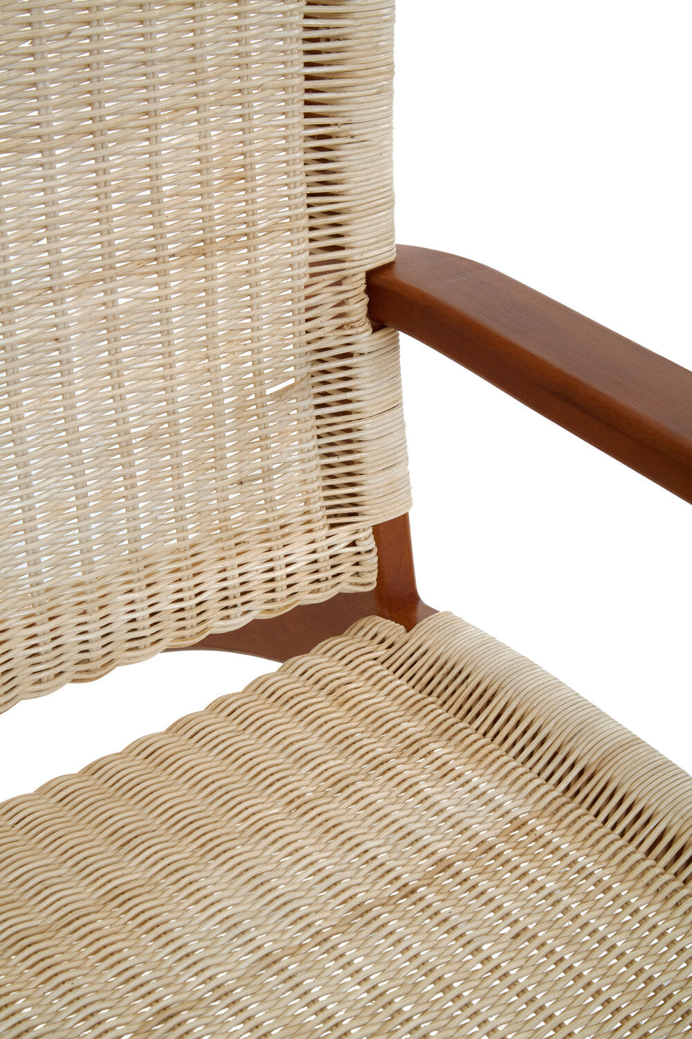Juno Natural Rattan Chair styled in a sunlit living room setting