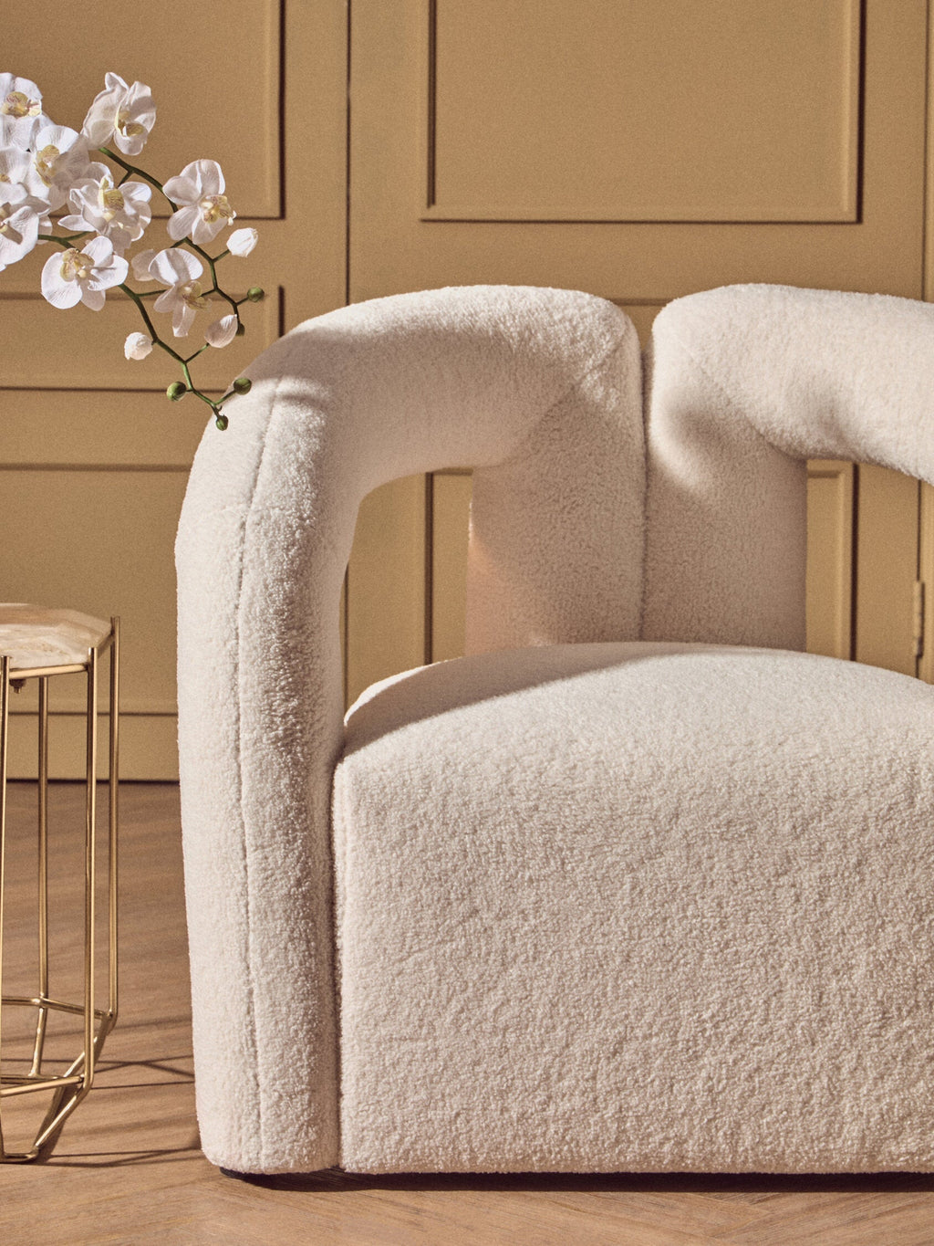 Diana Ivory Boucle Chair side profile showing architectural curved form