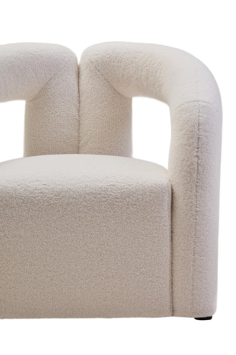 Diana Ivory Boucle Chair leg detail showing refined base