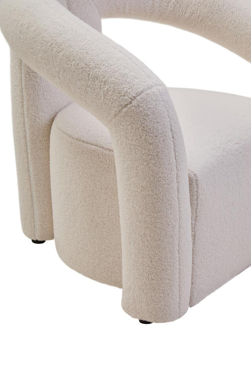 Diana Ivory Boucle Statement Armchair in neutral bedroom corner