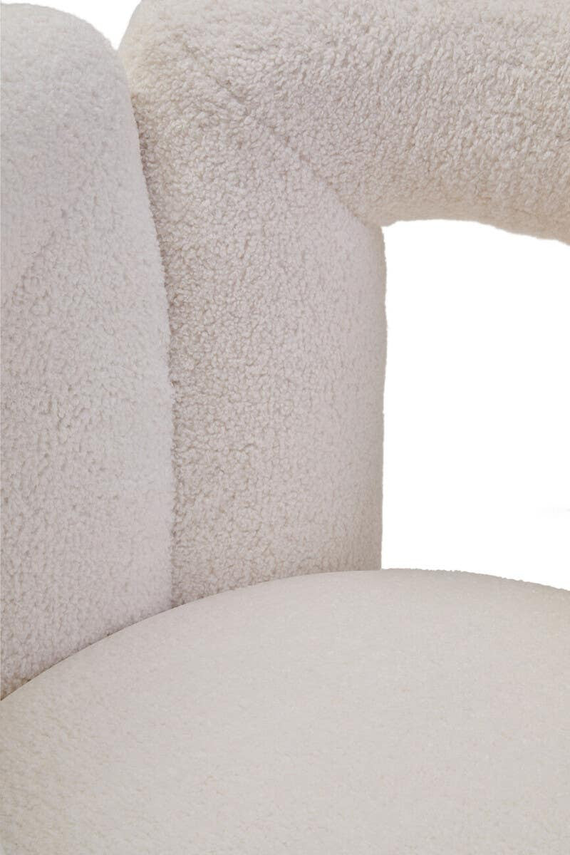 Diana Ivory Boucle Statement Chair styled in minimalist room setting