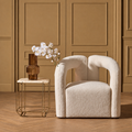 Diana Ivory Boucle Statement Chair – front view of sculptural armchair