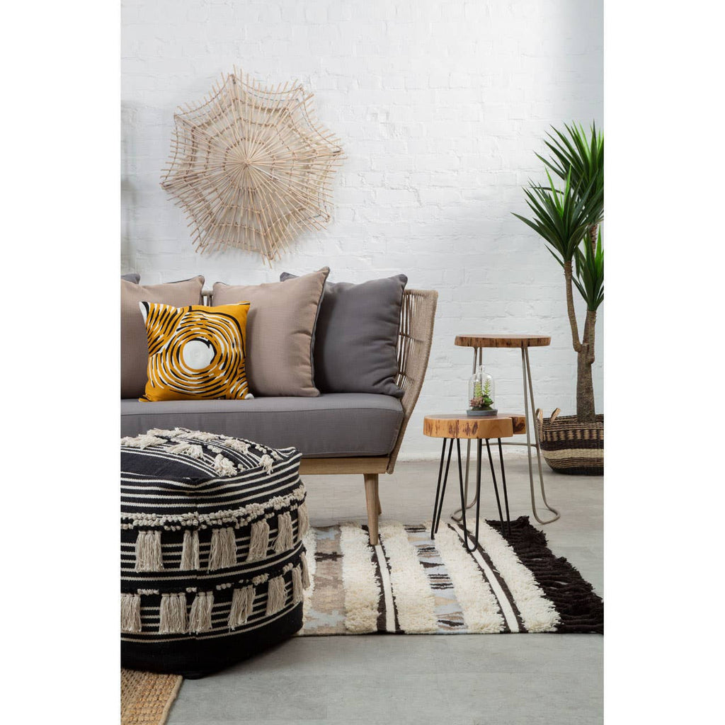 Nuvia Nexo Large Tribal Rug styled in living room as statement floor piece
