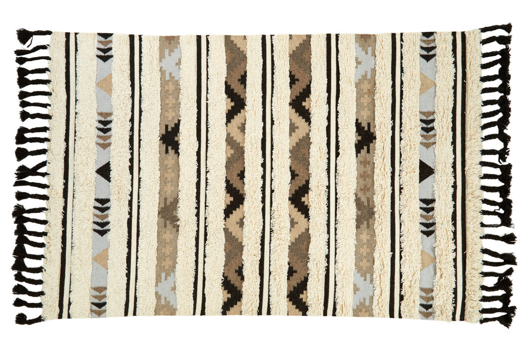 Nuvia Nexo Large Tribal Rug – hand-woven cream and black tribal pattern, overhead flat lay