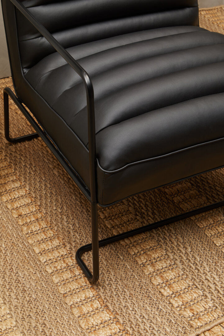 Nuvia Nexo Striped Hemp Rug in coastal-inspired bedroom setting