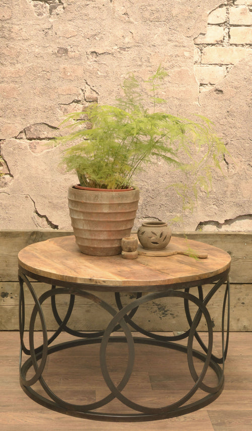 Old Empire Round Mango Coffee Table side view showing welded steel lattice frame