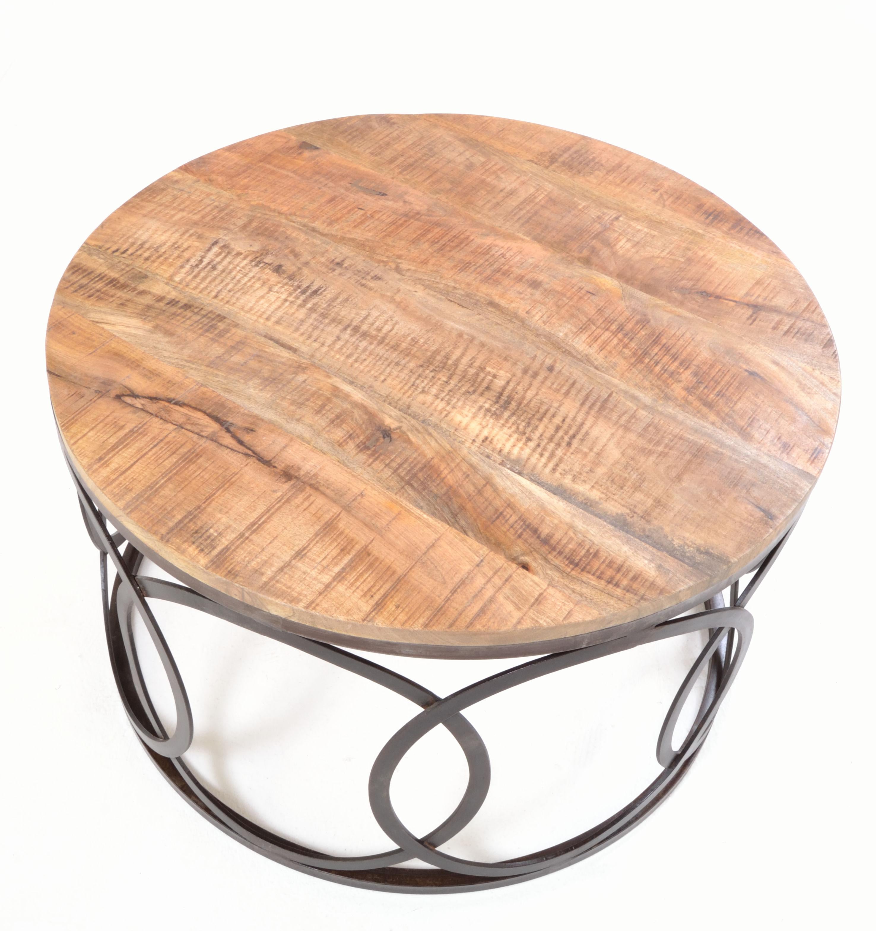 Old Empire Round Coffee Table styled in industrial-inspired living room