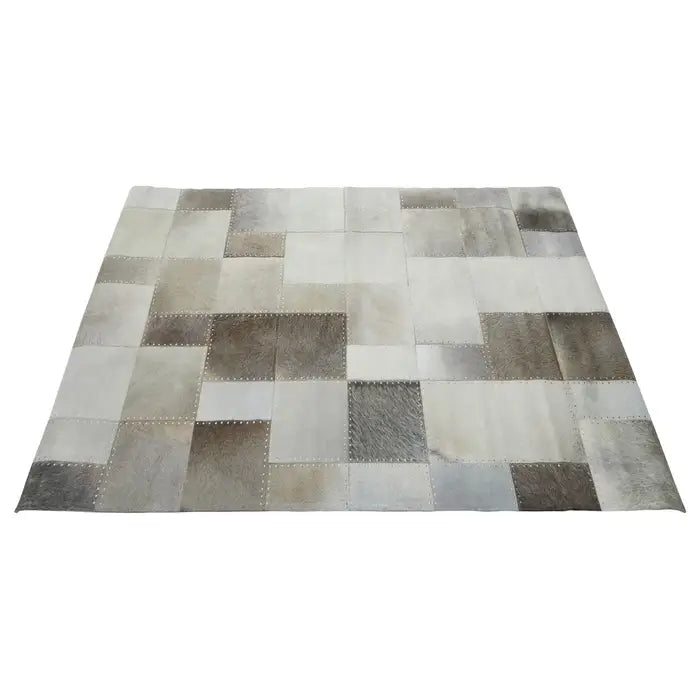 Vale Safira Grey Cowhide Rug patchwork seam and leather texture detail close-up