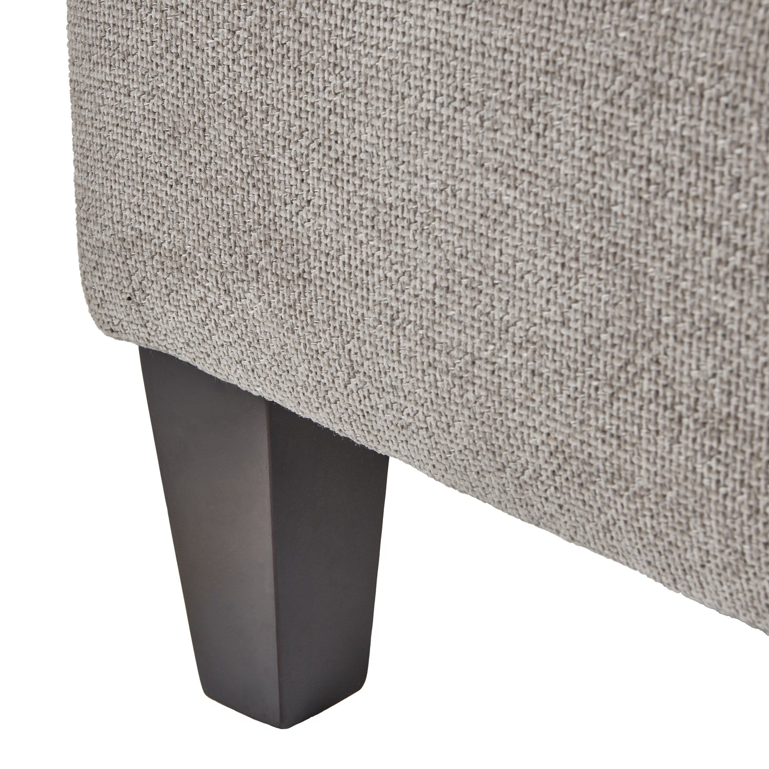 Vesper Taupe Ottoman styled in living room as footrest and low surface